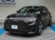 Camioneta SUV de lujo Audi Q3 2.0 S Line 180 Hp transmisión DSG automática año 2022 seminueva en color negro brillante, vista exterior frontal en ángulo de tres cuartos izquierda exhibida en Namacar Automotriz.