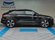 Camioneta SUV coupé de lujo Audi Q3 Sportback 2.0 S Line 180 Hp transmisión DSG automática año 2022 seminueva en color negro, vista exterior lateral perfil derecho completo exhibida en Namacar Automotriz.